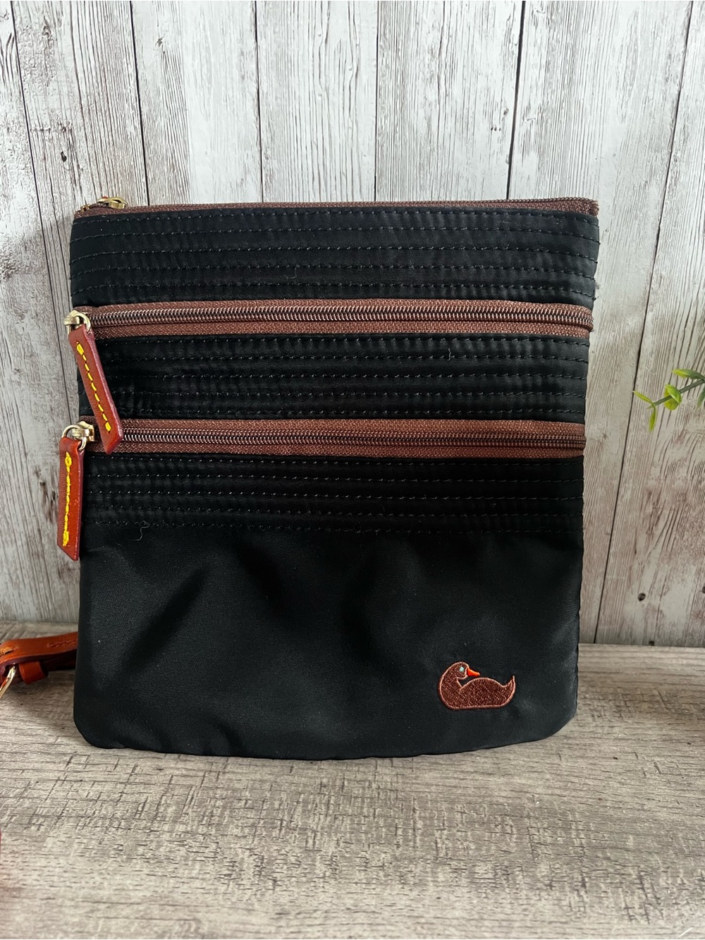Dooney & Bourke Black Nylon Triple Zip Crossbody Pink Interior